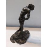 A D - a 20th century patinated lead figure of a nude man on a rocky base, 19cm h Location: 9:1