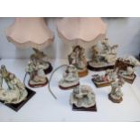 Capodimonte figures to include children in a cart signed, similar figures along with two lamps