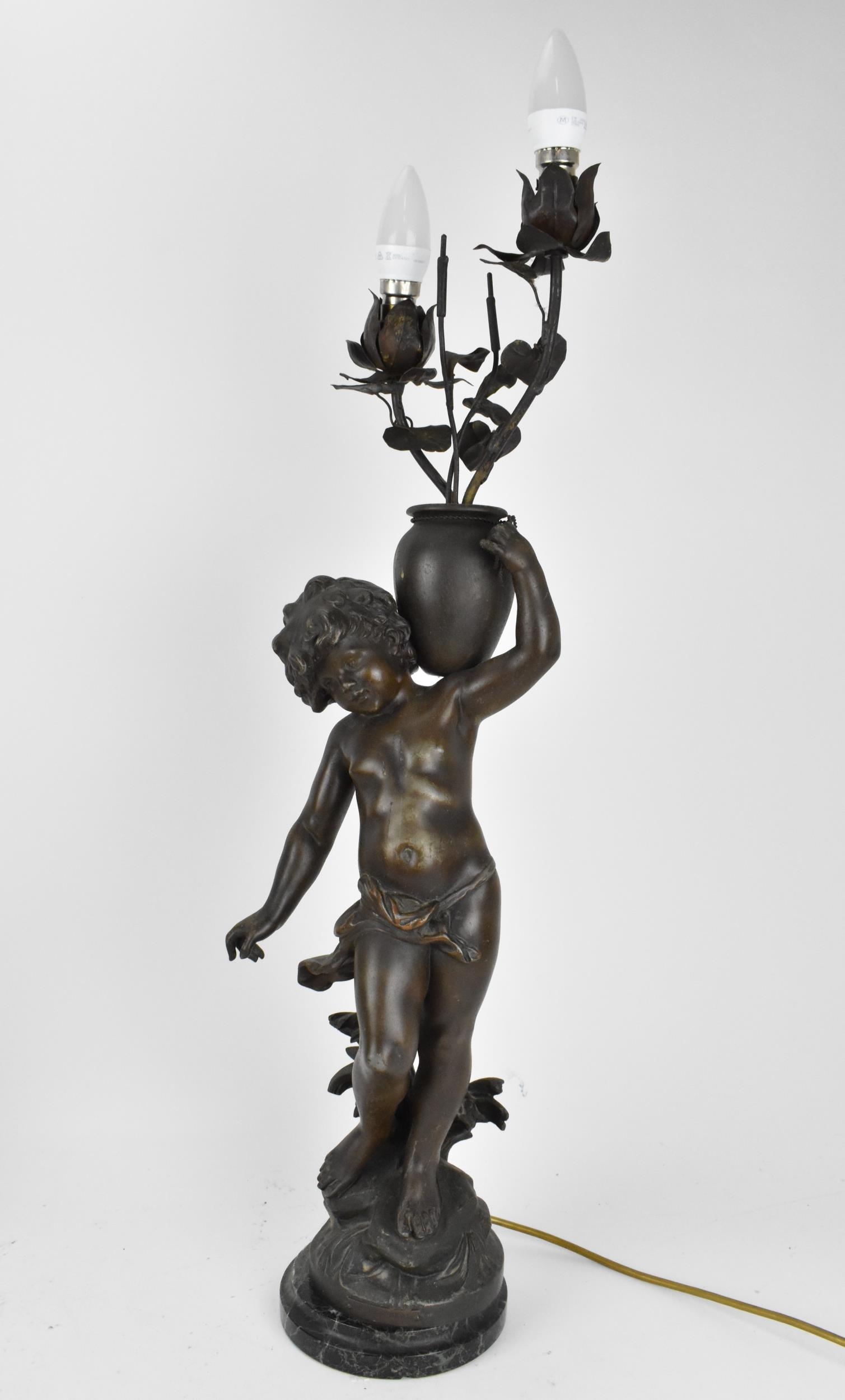 A late 19th century patinated spelter figural lamp after Auguste Moreau, 'Le ruiseau' (the