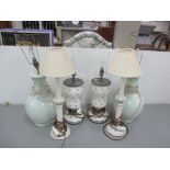 A mixed lot of lighting to include a floral chandelier and six table lamps Location: