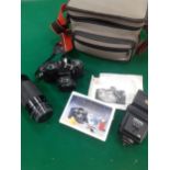 A Pentax P30 camera with accessories and travel case Location: A2B