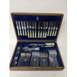 A Mappin and Webb silver plated rat tailed cutlery set, setting for eight, in an oak cased canteen