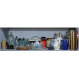 A mixed lot to include glass and stoneware bottles, oval mirror, Booths teapot, wash jug, pictures