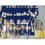 A quantity of vintage Community silver plated flatware and cutlery and other spoons, forks, and