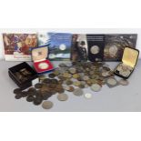 A mixed collection of coins to include 2015 proof coins, Magna Carta £2, Churchill £5 and others,
