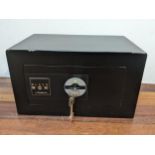 A black box chubb safe with key. LOCATION: