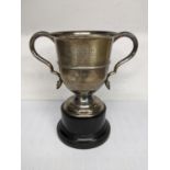 An early 20th century small silver trophy with engraving hallmarked Sheffield 1912, 118.2g Location: