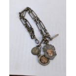 A late 19th/early 20th century silver pocket watch chain with T-bar and three fobs, 82.2g Location: