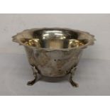 An early 20th century silver sugar bowl raised on four feet hallmarked Birmingham 1911, 85.2g
