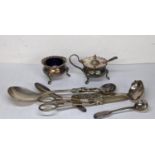 A silver Lincoln Imp caddy spoon, together with a Georgian teaspoon and two white metal spoons 141g,