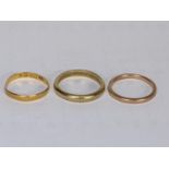 Three yellow metal wedding rings, total weight 6.3g Location: