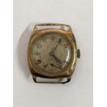 A 1930's 9ct gold manual wind watch in a cushion moulded case, hallmarked Chester 1935, 14.4g