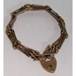 A 9ct gold gate link bracelet with a heart shaped padlock clasp, 6.6g Location: