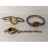 Three early 20th century 9ct gold ladies watch cases on gold plated bracelets, no movements