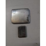 A George VI silver cigarette case with Art Deco and machine turned decoration, engraved initial to