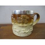 A 19th century two tone stoneware harvest/hunting mug of large proportions, white metal rim