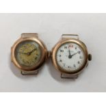 Two early 20th century 9ct gold ladies manual wind watches, 26.8g Location: