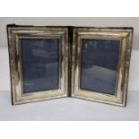 A late 20th century silver folding double photo frame, hallmarked London 1970 Location: