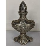 A late 19th/early 20th century import Hanau silver sugar caster of classical form and embossed