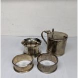 A silver lidded mustard and three silver napkin ring, 110g Location: