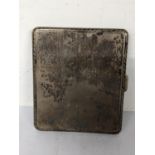 An early 20th century silver cigarette case having a gilded interior, hallmarked Chester 1929, 94.5g