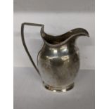 A Georgian silver milk jug, hallmarked London 1799, 91.4g Location: