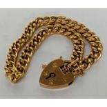 A 9ct gold curb link bracelet with a padlock clasp, 10g Location: