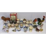 A collection of 19th century and later egg cups including Derby, together with thimbles and