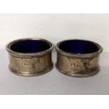 A pair of 1930's silver salt pots, hallmarked London 1938, weight excluding glass liners, 113g