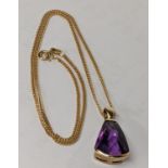 A 9ct gold necklace inset with a large amethyst Location: