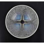 A Lalique 'Coquille' pattern iridescent bowl, of circular form with four relief shells, the