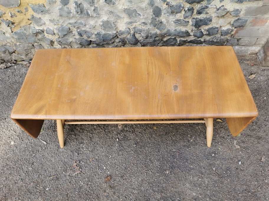 An Ercol style blonde elm and beech drop-leaf Windsor coffee table, no visible label, total width - Image 2 of 7