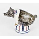 A studio pottery model of a prize pig by David Cleverly (contemporary), the circular base with motto