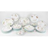 A 19th century Wedgwood creamware forty-seven piece part dinner service, in exotic birds, specimen