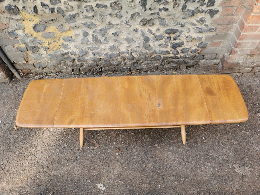 An Ercol style blonde elm and beech drop-leaf Windsor coffee table, no visible label, total width - Image 4 of 7