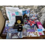 Olympic London 2012 memorabilia to include a cased silver proof £2 coin, box containing various