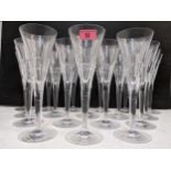 Jasper Conran designed for Stuart Crystal a set of eighteen tall cut glass champagne flutes, each