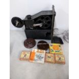 A 1930's Pathescope projector and mixed films to include mickey Mouse and others Location: