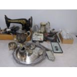 A mixed lot to include a silver plated tray, tea pot, cutlery, Singer sewing machine and other items