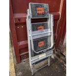 A pair of Little Giant folding ladders Location: