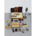 Mixed smoking related items to include cigar box and tin, leather holders, leather embossed vesta