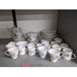 A Susie Cooper Talisman part coffee and tea service comprising approximately 59 pieces, along with