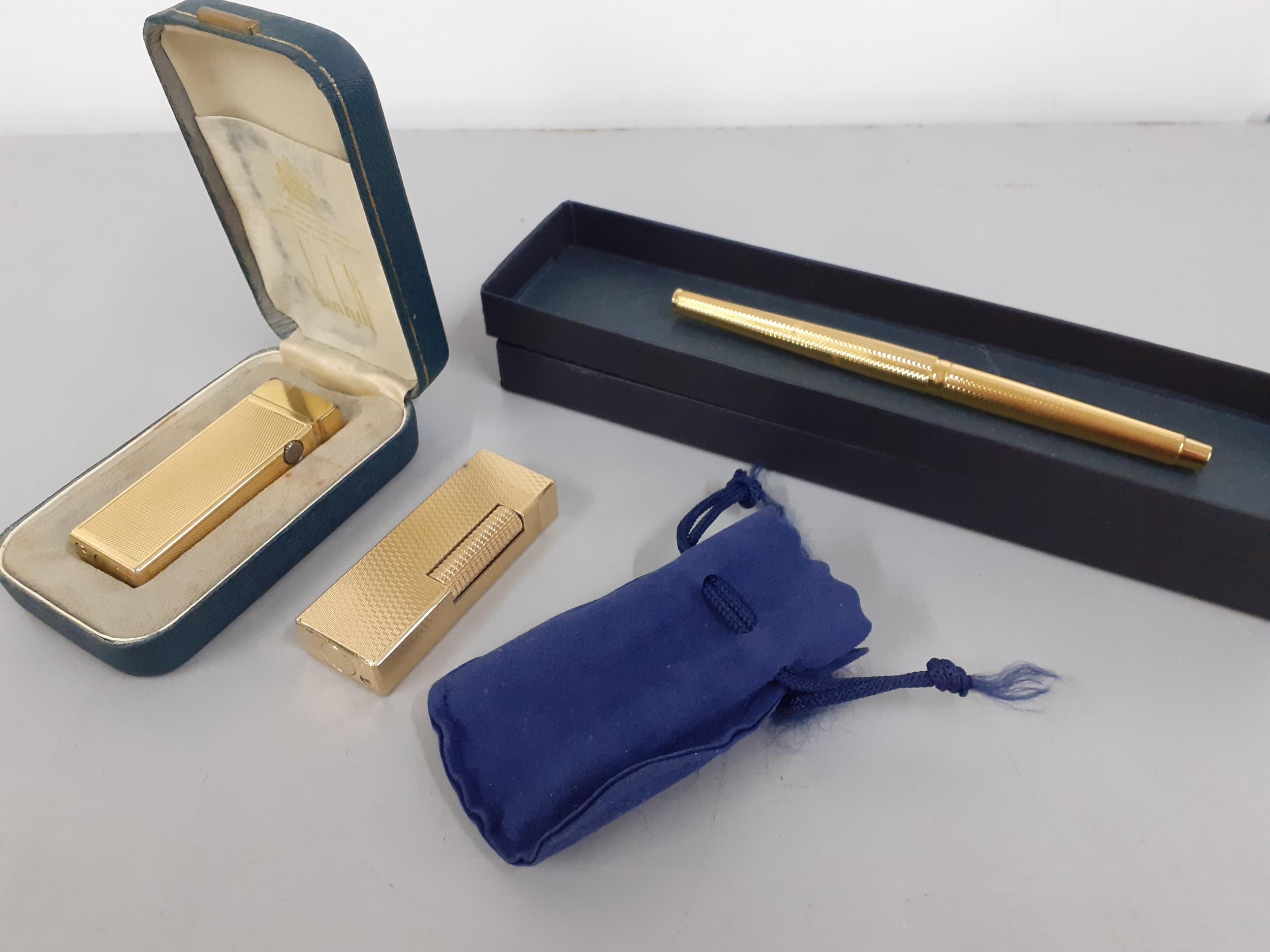Two gold plated Dunhill cigarette lighters and a gold plated Parker fountain pen Location: - Image 2 of 2