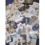 Mixed photographs, drawings and ephemera to include a WWI soldier's photograph, written Uncle Tom,