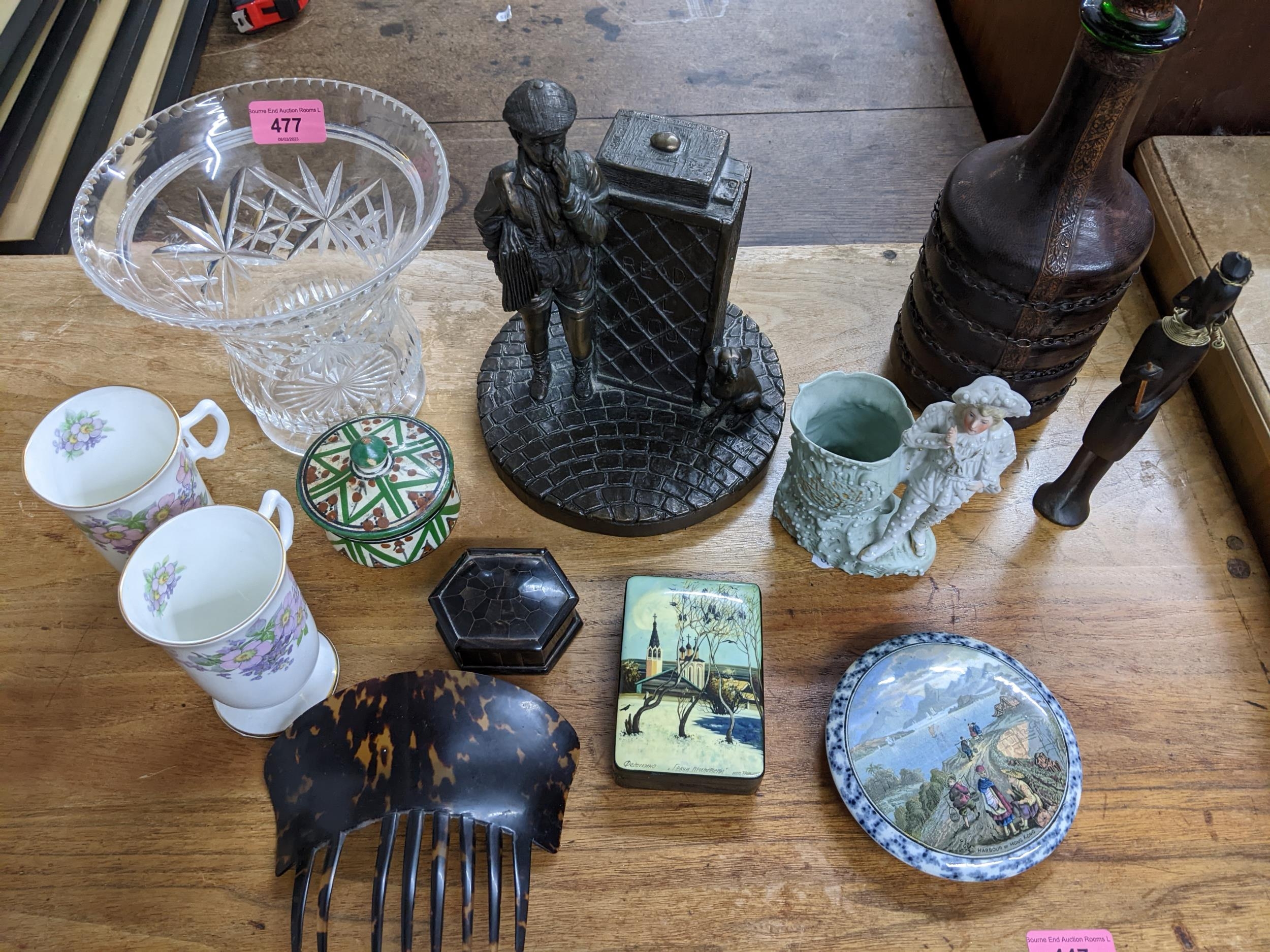 A mixed lot to include an Irish bronze resin figure group of a newspaper boy and his dog, a