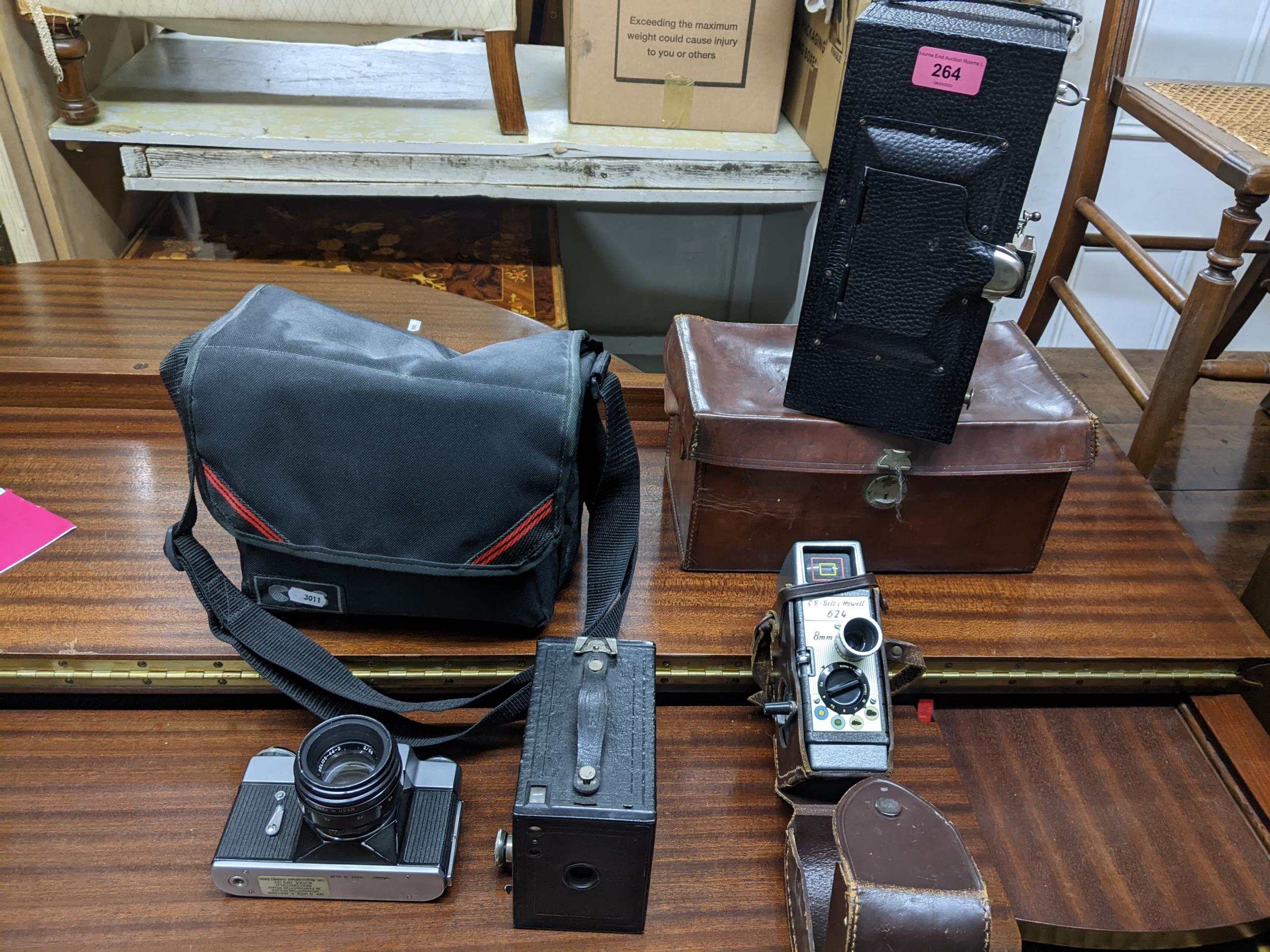 Vintage cameras to include a leather cased No4 Panorama Kodak model D box camera, a Zenit-B camera