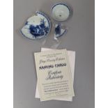 Nanking Cargo - a blue and white pagoda tea bowl and saucer A/F, with certificate of authenticity