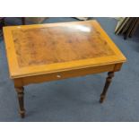 An Italian Dal Negro games table having a burr walnut veneered top, with contents Location: