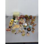 A collection of animal ornaments to include rabbits, cats, dogs, pigs and others together with