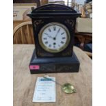 A Victorian 30 day mantel clock with white enamel Roman dial, moon hands, the movement stamped for